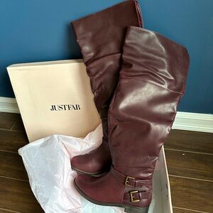 New, never worn burgundy fall boots. Buckles are still wrapped. Slight slouch.